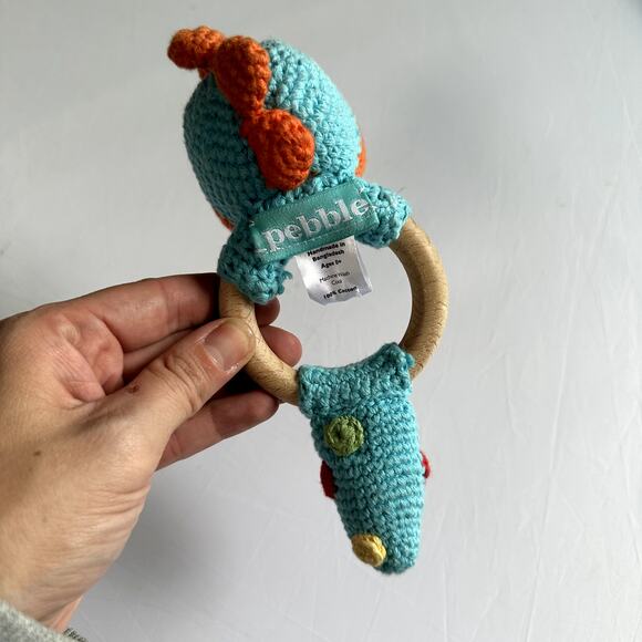 Pebble Hand Knit Turquoise Dinosaur Wooden Teething Ring w/ Rattle - Picture 3 of 10